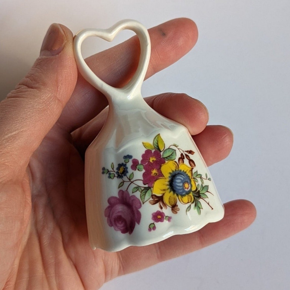 Vintage floral Brinton Bone China bell with heart handle